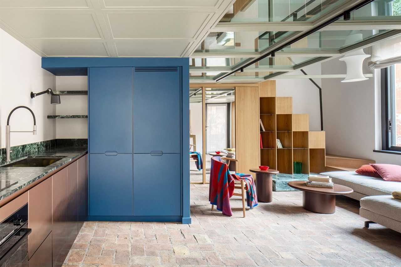 A Glass-Floor Mezzanine Shatters Conventions in This Reworked Rome Apartment