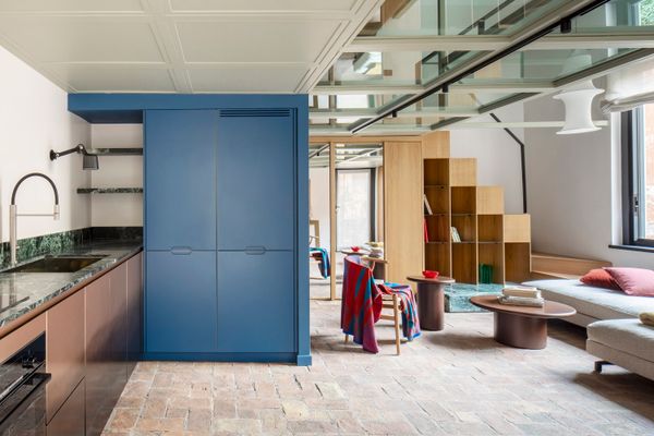 A Glass-Floor Mezzanine Shatters Conventions in This Reworked Rome Apartment
