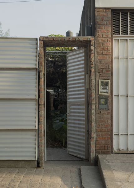 Este Norte Estudio turned a 1950s home in Resistencia, Argentina, into a multiunit complex with apartments and workspaces that balance privacy with chance interaction.