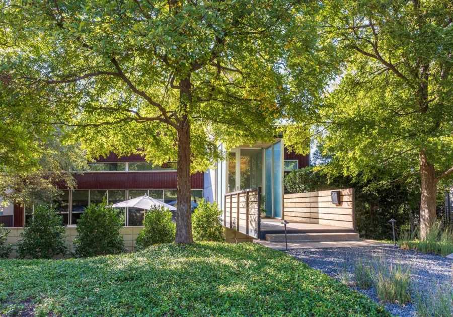 Cross the Bridge to Enter This $1.4M Dallas Home Wrapped in Cor-Ten Steel
