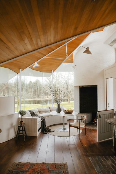 The iron and brick inglenook fireplace weighs over one ton, anchoring Messick's addition.