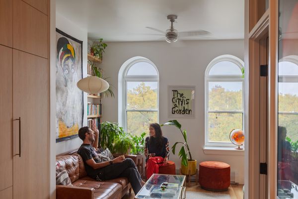 Located in a pre-war building, the floor-through unit had a fairly generic layout: two bedrooms on either end and a cloistered kitchen and living area in the center. 