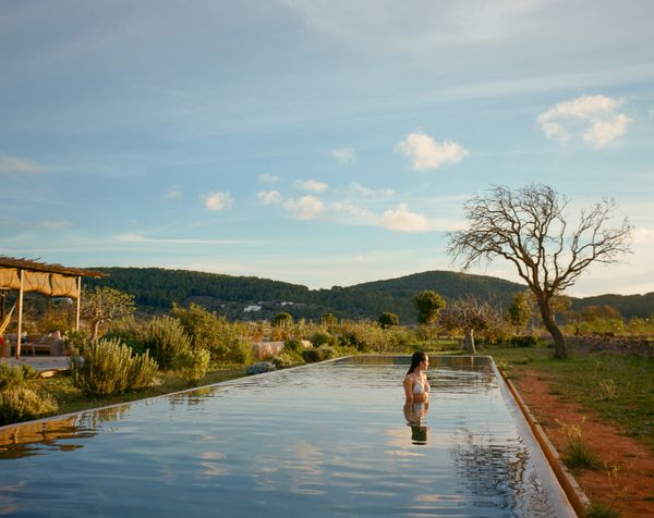 Slightly elevated and with no decking, the pool is inspired by Ibiza’s old agricultural reservoirs.