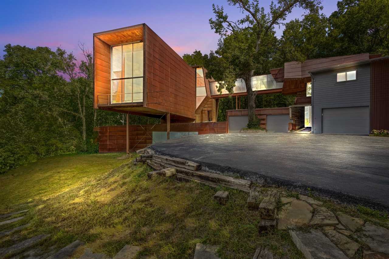 A Bridge Connects the Wings of This Wild $1.3M Home in Nebraska