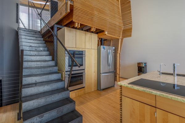 A Bridge Connects the Wings of This Wild $1.3M Home in Nebraska