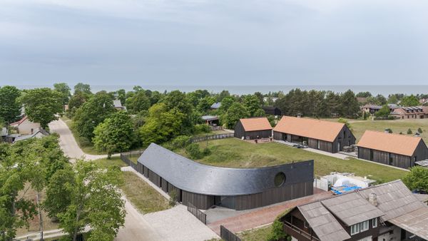 On the Latvian Coast, a Sea-Inspired Twist on the Gable Home