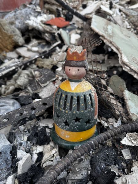 One of three wise men candleholders that her father brought back from Turkey was found in the rubble of what had been her garage.