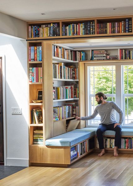 Cabinets double as a back rest for bench seating.