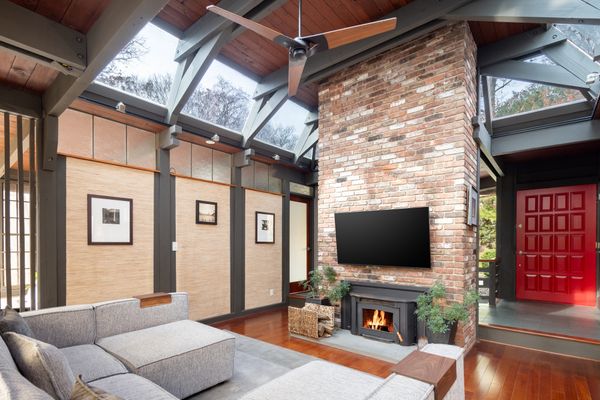 Clerestory windows bring natural light into the entryway and living room.