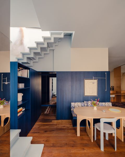 Seating, Shelving, and Spatial Definition—a Blue Box Does It All at This Refreshed Berlin Flat