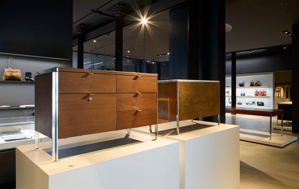 Wood veneer and burl-fronted pieces as seen at the SOM exhibit.