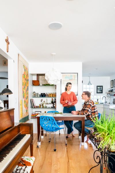 In 2014, Dan purchased and renovated a 900-square-foot, circa-1956 farmhouse, adding new ash floors and removing a wall between the living room and kitchen. After he and Jessica married, they added a 200-square-foot addition.