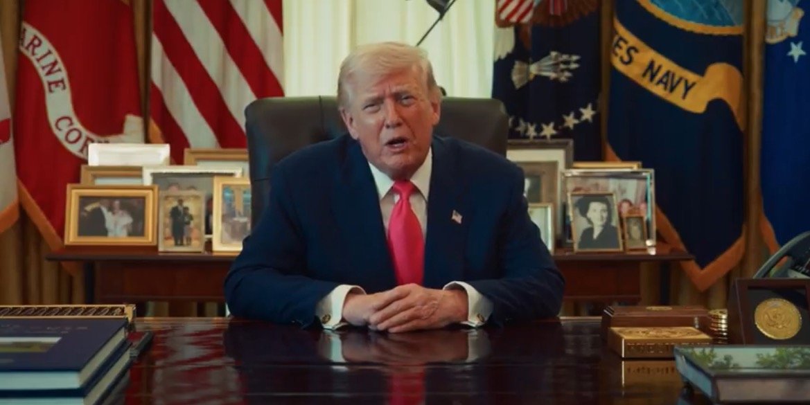 Former President Donald Trump seated at a desk in the Oval Office, flanked by flags and family photos, addressing the camera.