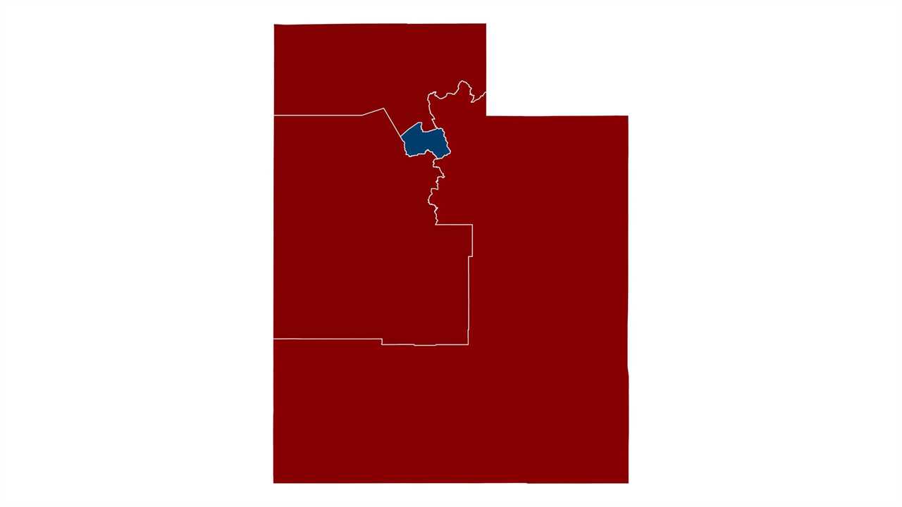 Map of Utah highlighting Salt Lake County in blue against a red background, illustrating political or demographic divisions within the state.