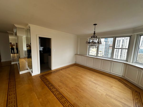Before: Prior to renovation, the kitchen was walled off from the dining and living areas, giving the unit a closed-off feel.