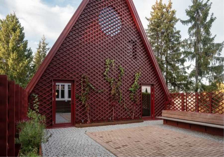 How a Tiny Red Home in Norway Turned Into a Compound of Gables