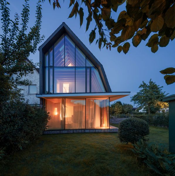 You’d Never Believe This Angular Glass Facade Stands Among Former Military Barracks