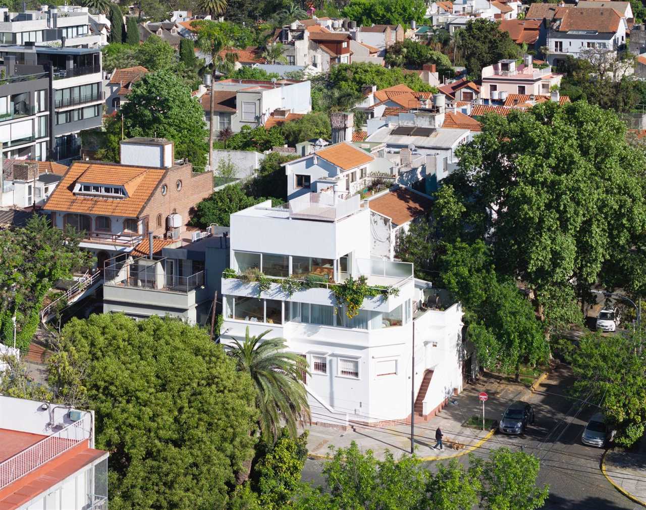 Budget Breakdown: A Buenos Aires Couple Build an Airy Live/Work Home Atop Mom’s Office for $153K