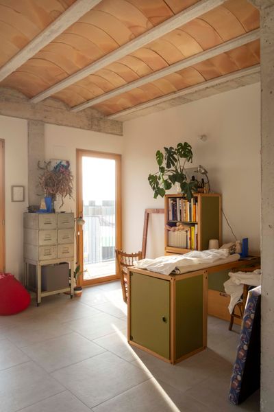 The individual apartments have typical <i>volta catalana </i>(Catalan vault) ceilings. They range from 500 to 662 square feet, but the building has 3,121 square feet of shared space for the residents.