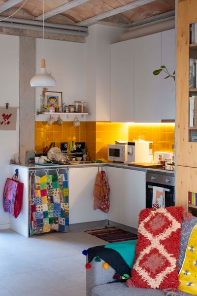 Barcelona architecture practice Lacol designed the co-op with attention to reducing energy costs. Instead of individual heating and air-conditioning systems, temperatures in the apartments and indoor common spaces are controlled via a radiant system.