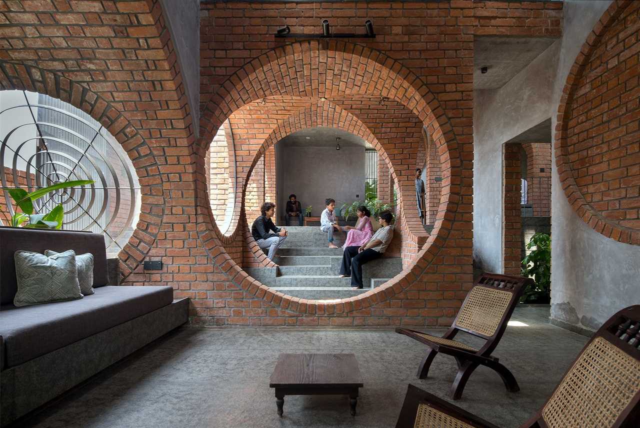 Brick Portals Channel Light and Air in This Multigenerational Home in India