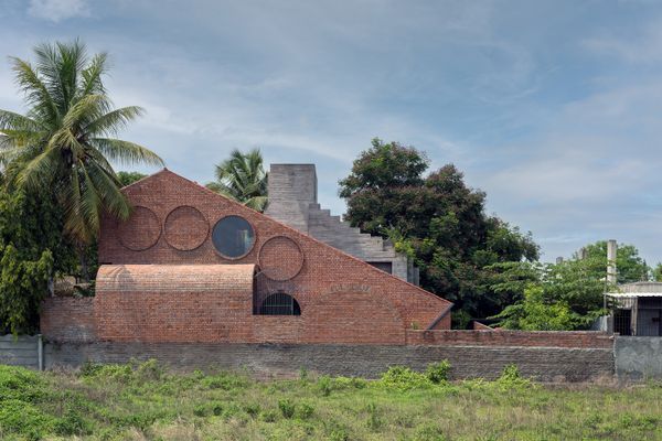 Brick Portals Channel Light and Air in This Multigenerational Home in India