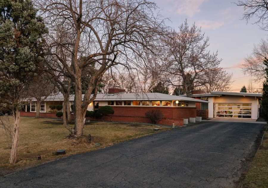 Take in Mountain Views From the Outdoor Living Room at This Revamped Midcentury Asking $1.1M