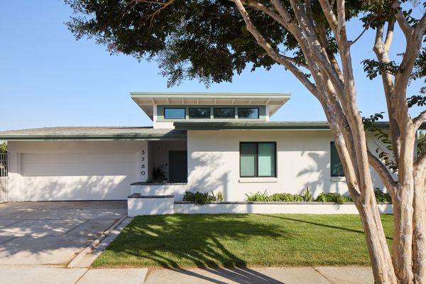 The exterior profile stayed the same, but Shin added a fresh coat of paint and new windows.