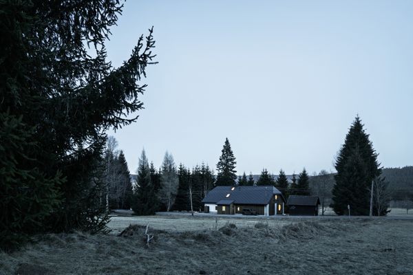 A Fiber-Cement Structure Forms the Interiors of This 19th-Century Czech Cottage
