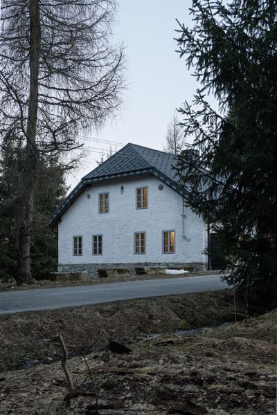 A Fiber-Cement Structure Forms the Interiors of This 19th-Century Czech Cottage