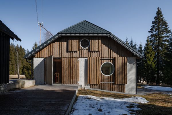 A Fiber-Cement Structure Forms the Interiors of This 19th-Century Czech Cottage