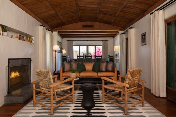 The two-bedroom Adobe house was built in the early 1900s—and features a living room stage and a wine cellar. Opera singer Lawrence Tibbett installed the stage and Charlie Chaplin is said to have performed here.