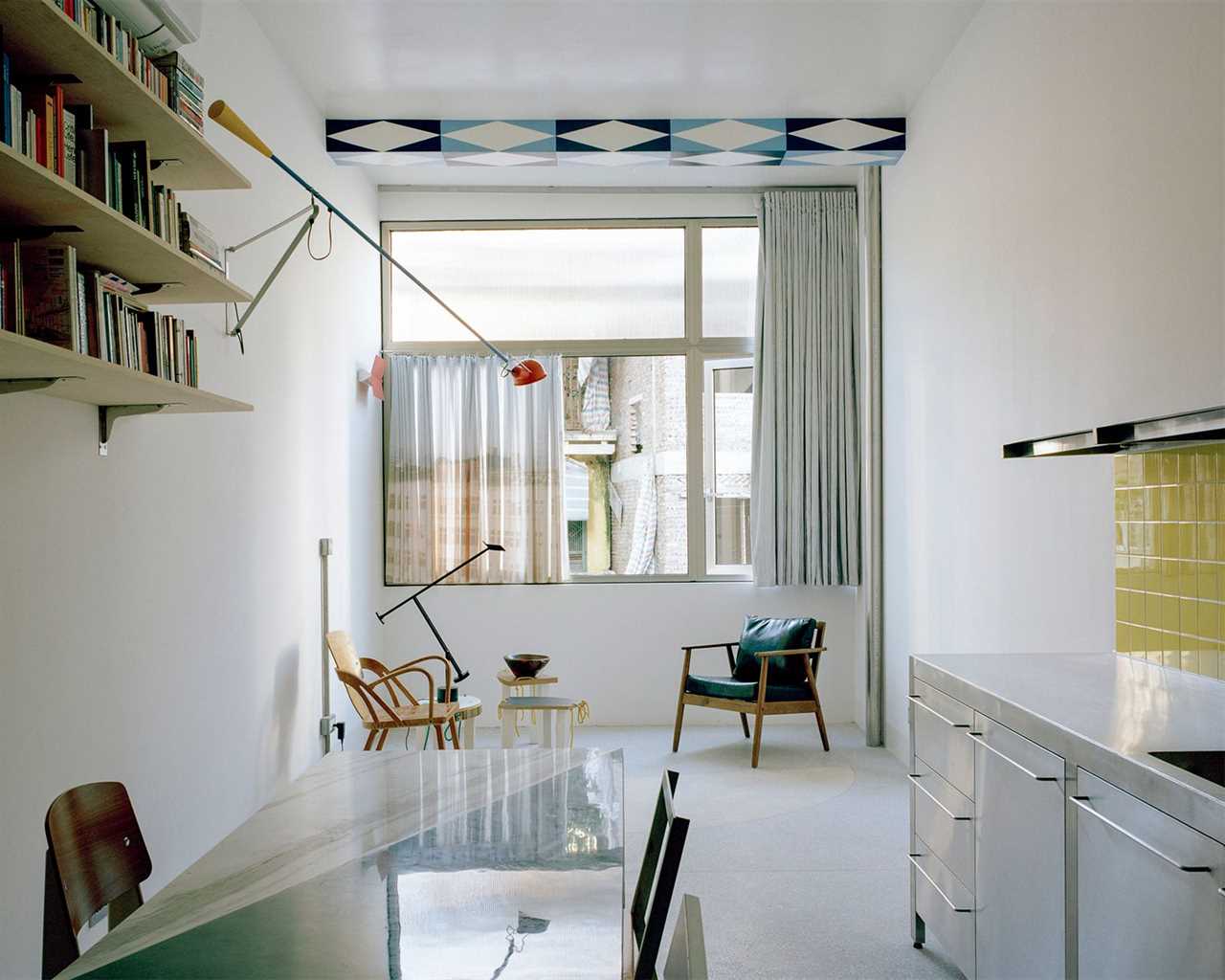 A Kind-of-Scary Staircase Was the Key to Lightening Up This Once-Dark Hanoi Tube House