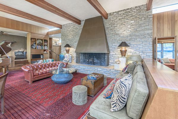 The Bedrooms Cantilever Over the Woods in This $1.6M Missouri Midcentury