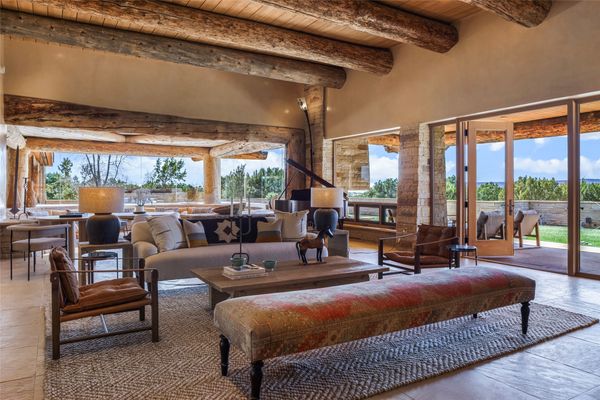 One can catch views of the sunset over Jemez Mountains from the oversized living room windows.