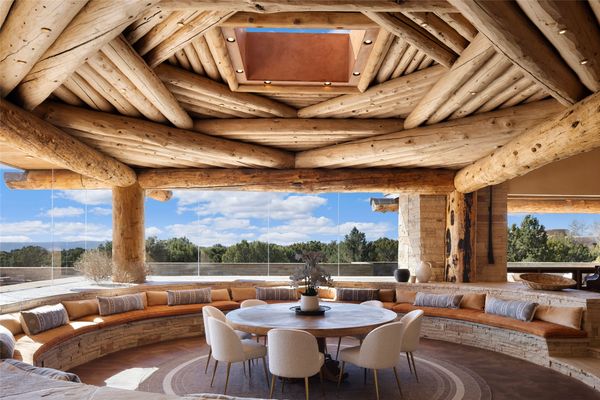 The ceiling above the dining area features a unique structure with an opening in the middle, dubbed "Hogan-style