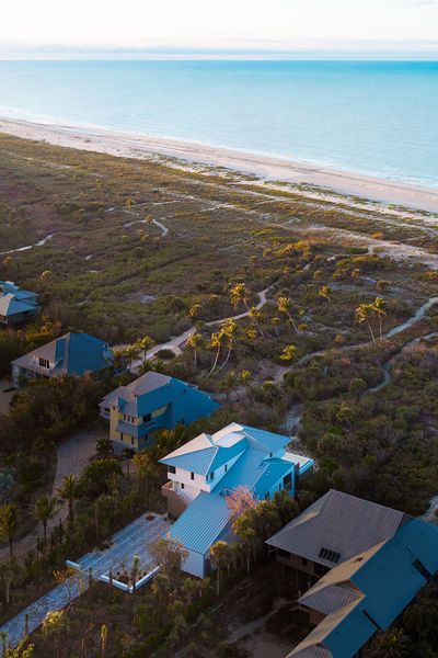 Architecture firm La Dallman designed a vacation home on Sanibel Island, Florida, to withstand hurricanes and flooding.