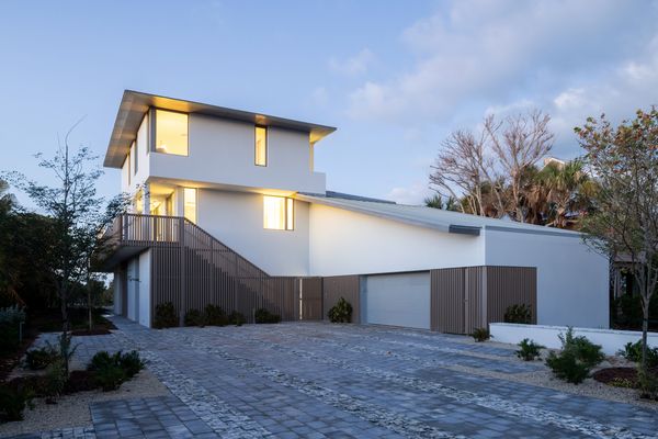 The living spaces are elevated 16 feet above ground level, one of FEMA’s requirements for homes in the area.
