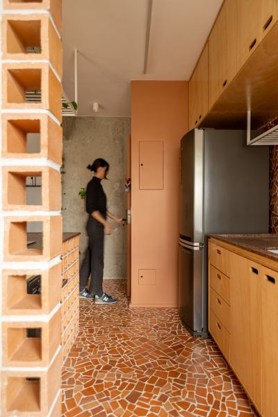 Beautifully Chaotic Caquinhos Tile Grounds This Small Apartment Renovation in Brazil