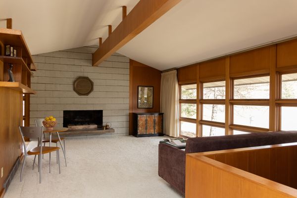 A the interior finishes are a mixture of concrete block and wood paneling.