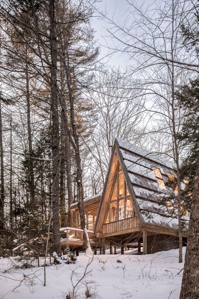 The roof is made from locally milled hemlock board shingles that were left natural to allow them to weather, turning from bright tan to silvery gray over time. Four foot long boards in widths of 4, 6 and 8 inches were laid with a deep overhang to give the roof a textured look.