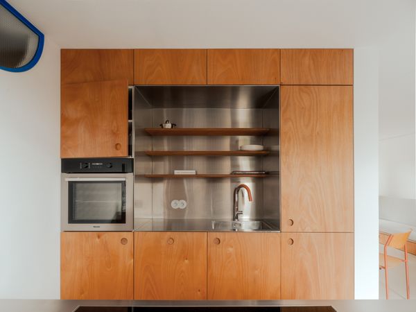 Would You Believe This Prim Amsterdam Apartment Was Once Part of a Sewage Treatment Plant?