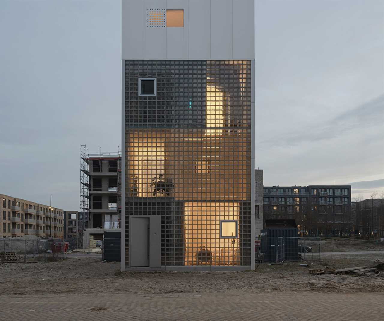 A Gazillion Glass Blocks Balance Light and Privacy at This Slender Prefab Home in Amsterdam