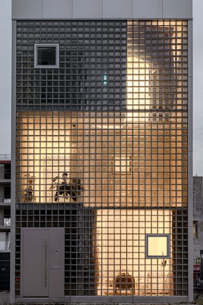 A Gazillion Glass Blocks Balance Light and Privacy at This Slender Prefab Home in Amsterdam
