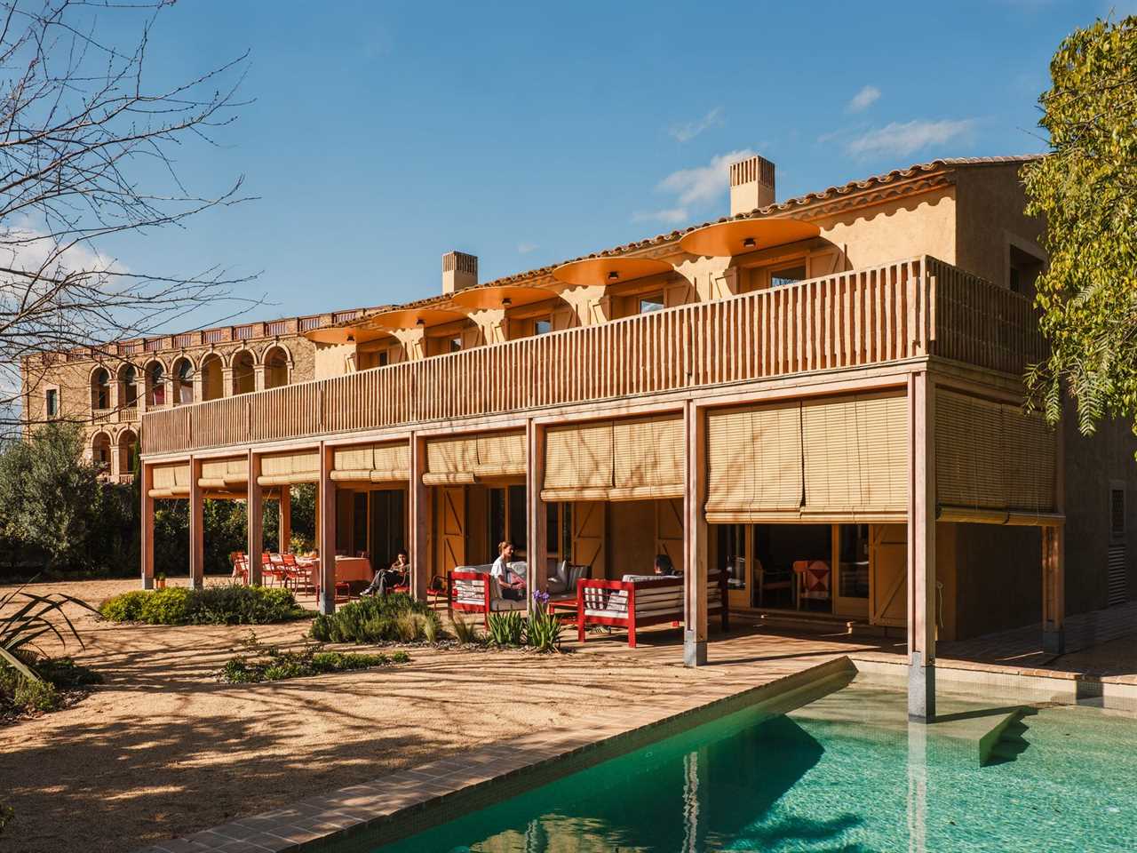 Circular Additions and a Triangular Atrium Turn a Generic Spanish Home Into a Personal Paradise