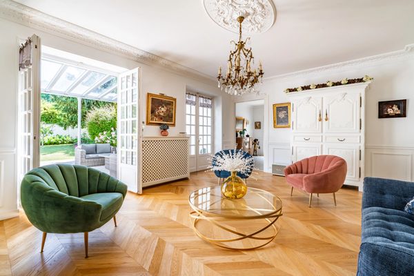 Topped With a Colorful Shingled Roof, an Ornate French Villa Seeks $2.5M