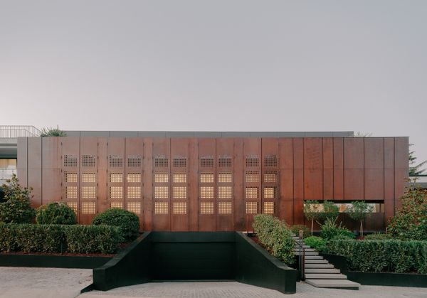 Massive Steel Panels Conceal (and Reveal) a Deceptively Airy Home in Tbilisi
