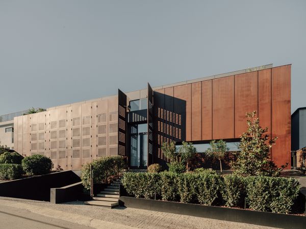 Massive Steel Panels Conceal (and Reveal) a Deceptively Airy Home in Tbilisi