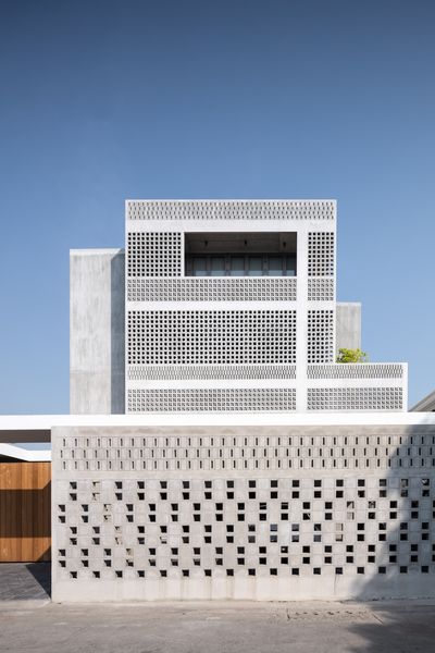 You Couldn’t Begin to Count the Perforations in the Facade of This Bangkok Home