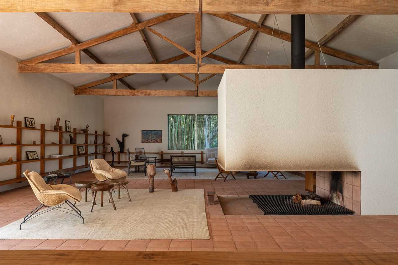 A Monumental Hearth Anchors This Agricultural Building Turned Home in Brazil